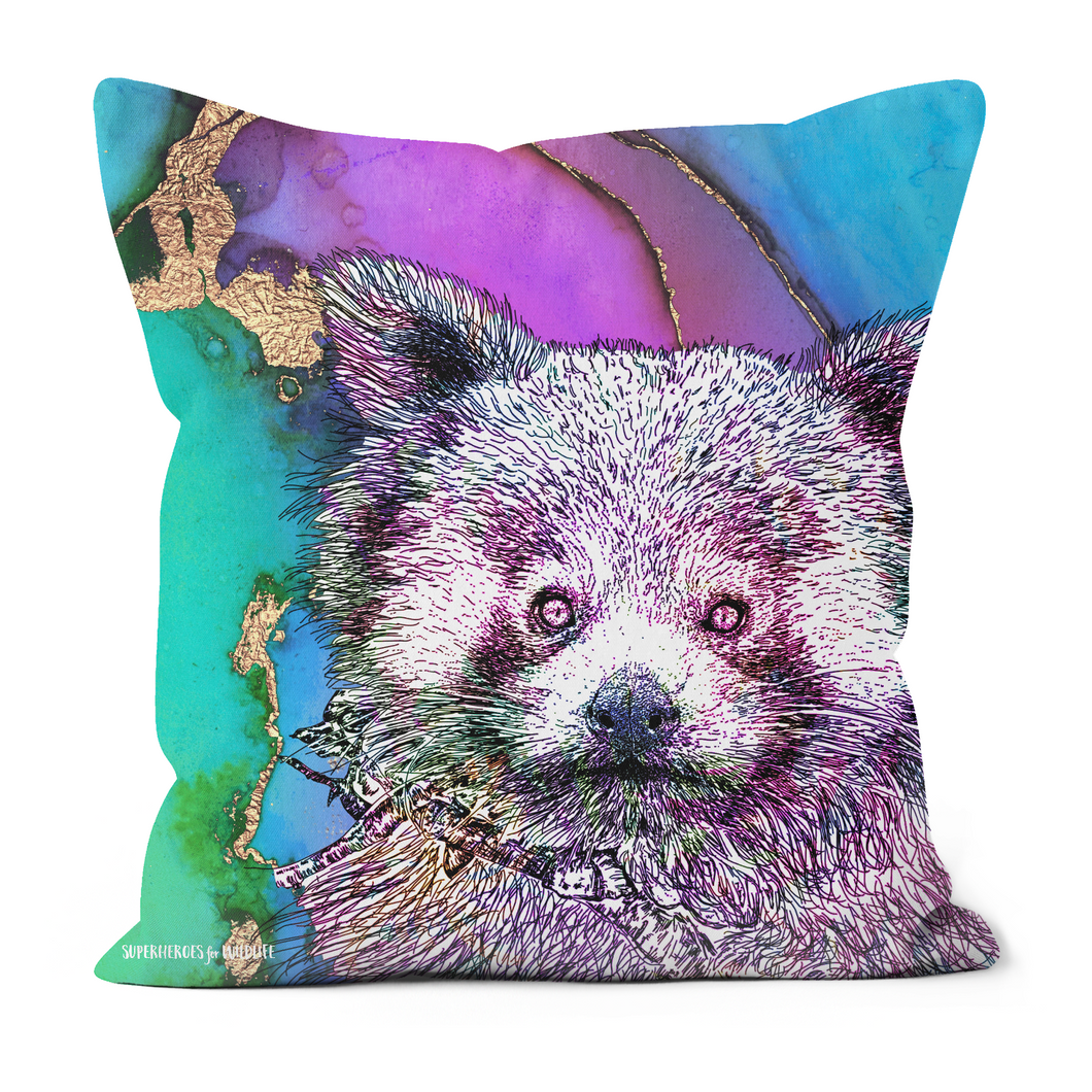 A red panda on a multi-coloured cushion