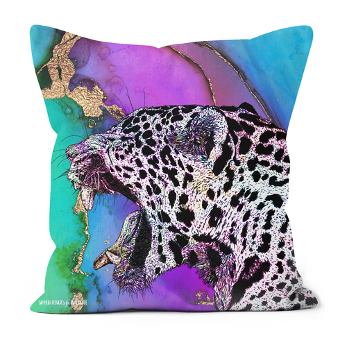 A stunning jaguar on a purple, green and blue cushioin